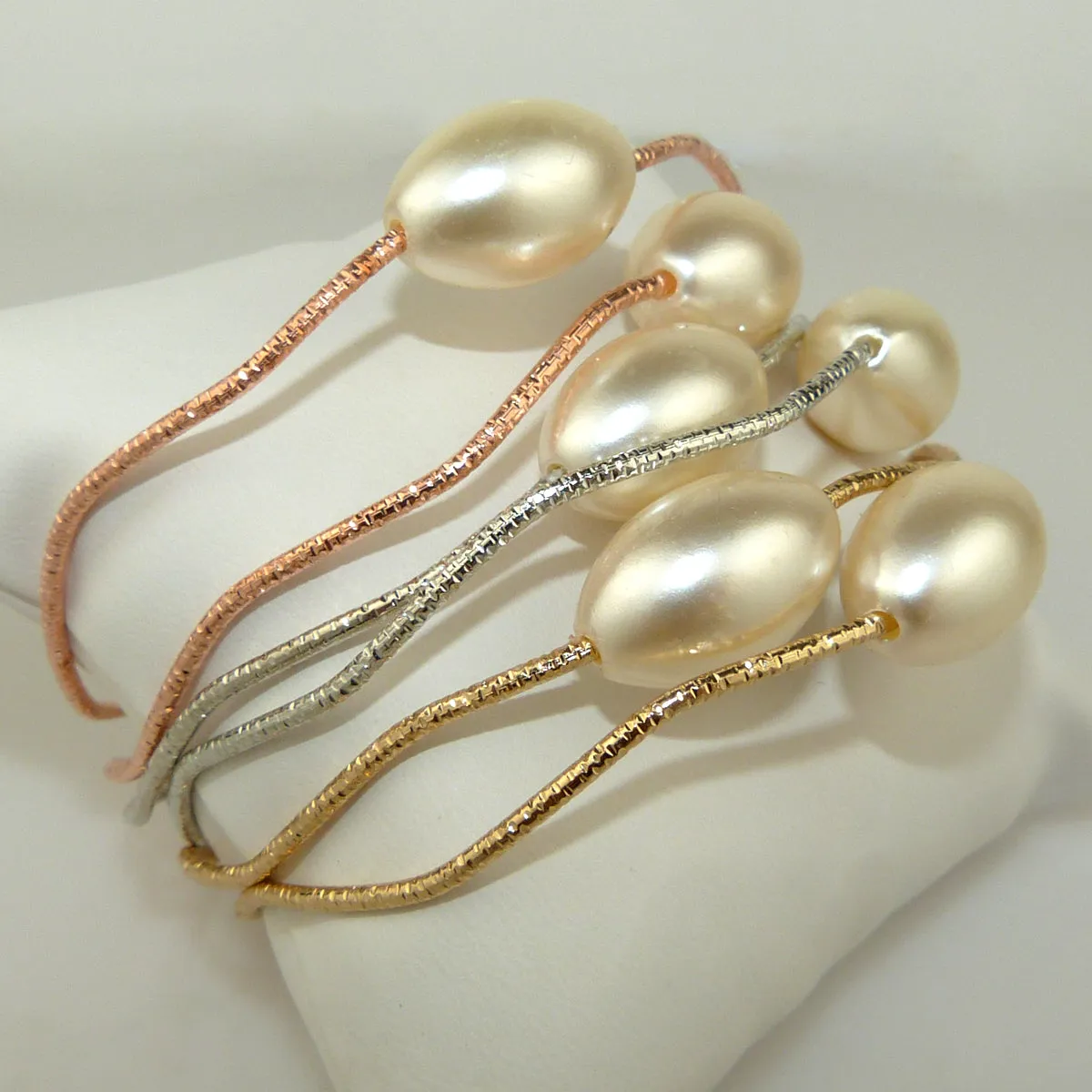 Set of Gold Silver Rose Gold Toned Bangles Bracelets with Pearls by Liza Kim