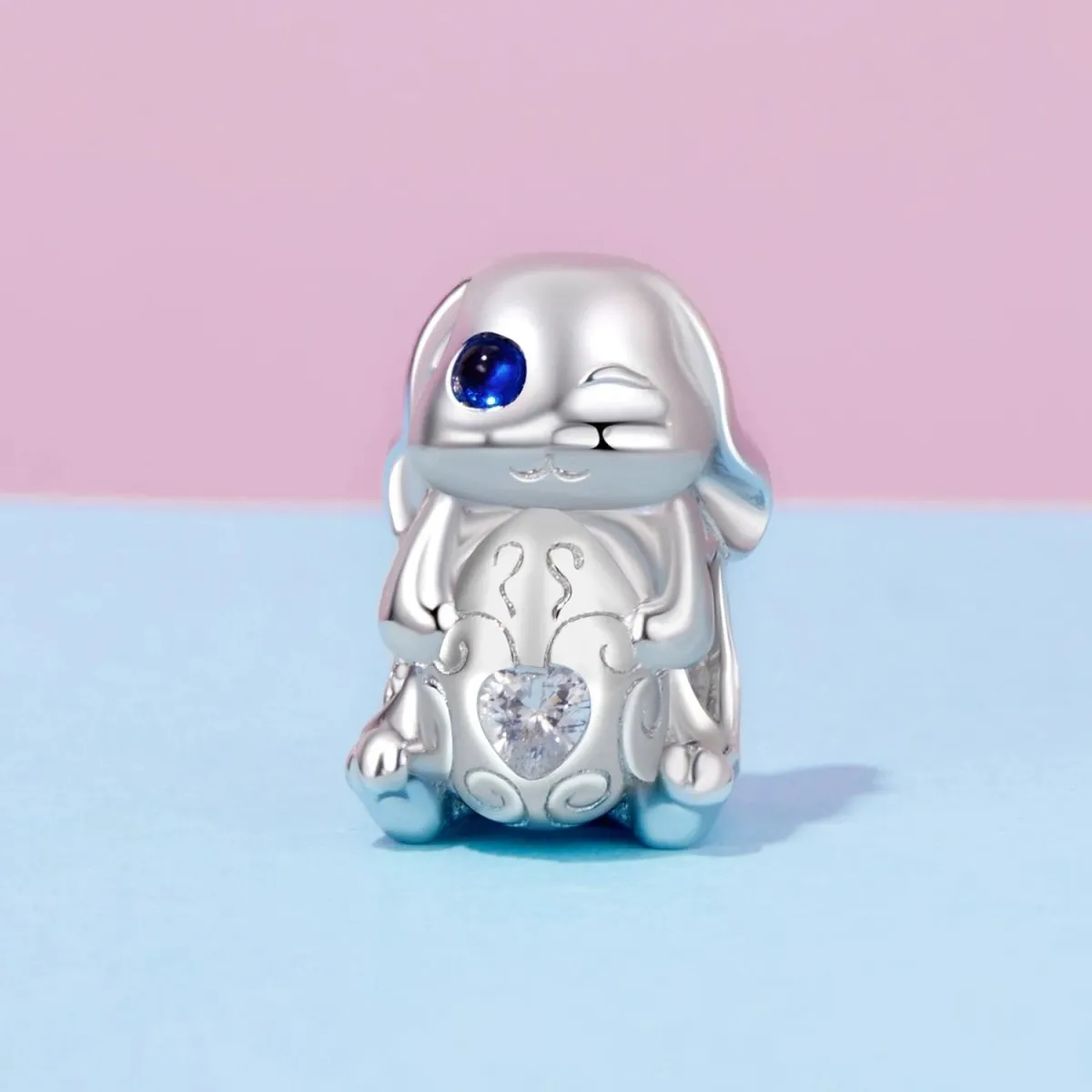 Winking Bunny with Heart-Shaped Egg Charm