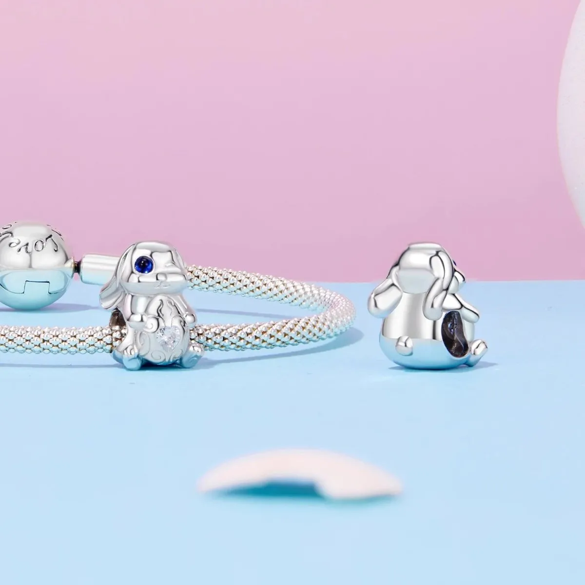 Winking Bunny with Heart-Shaped Egg Charm